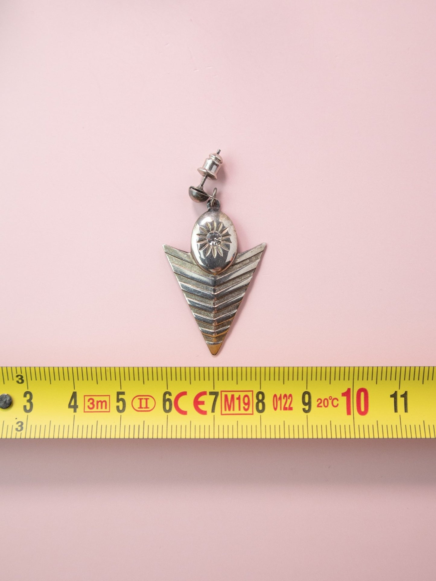 Orecchini triangolari colore argento - abbigliamento vintage Rivesty