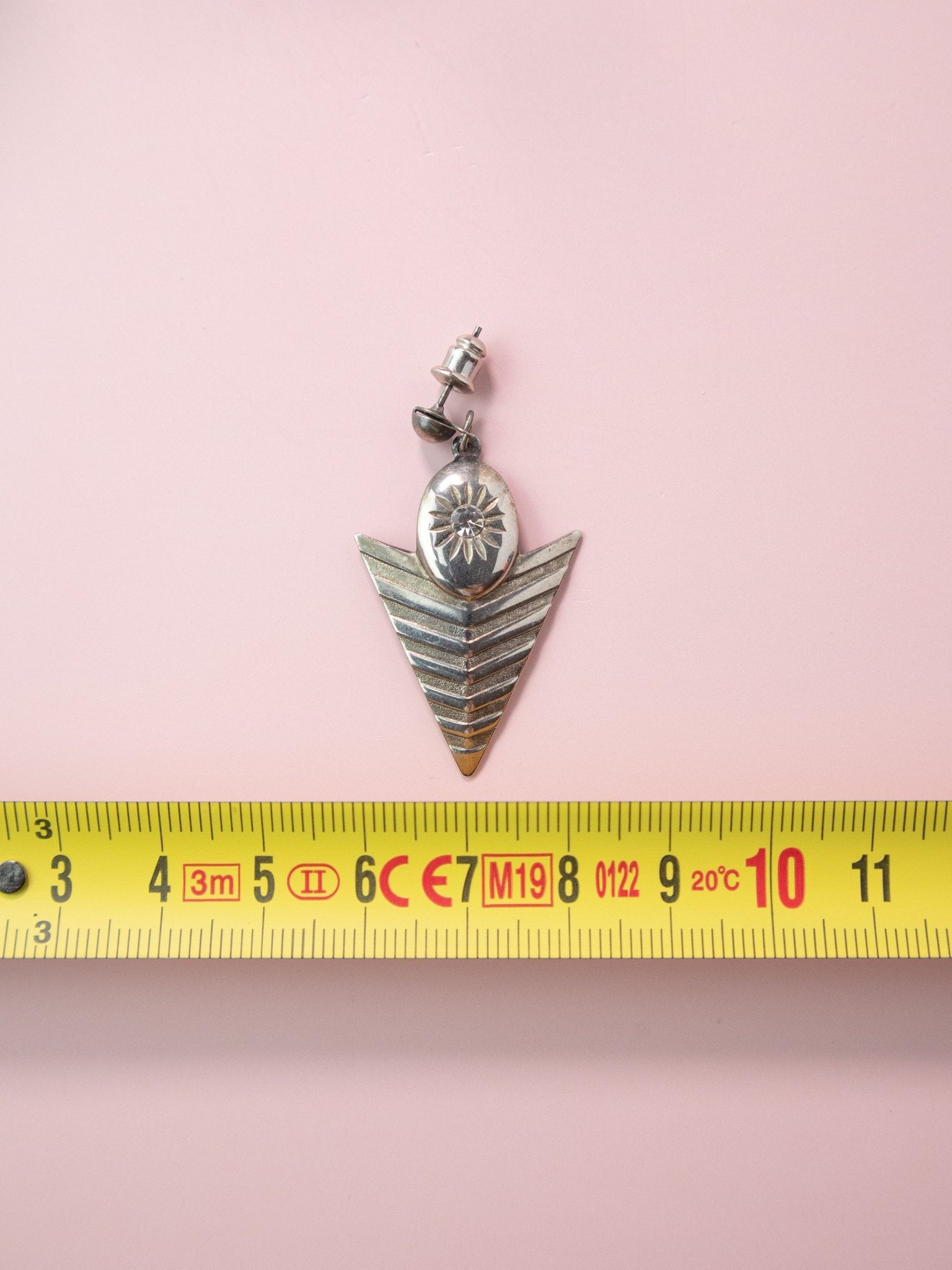 Orecchini triangolari colore argento - abbigliamento vintage Rivesty